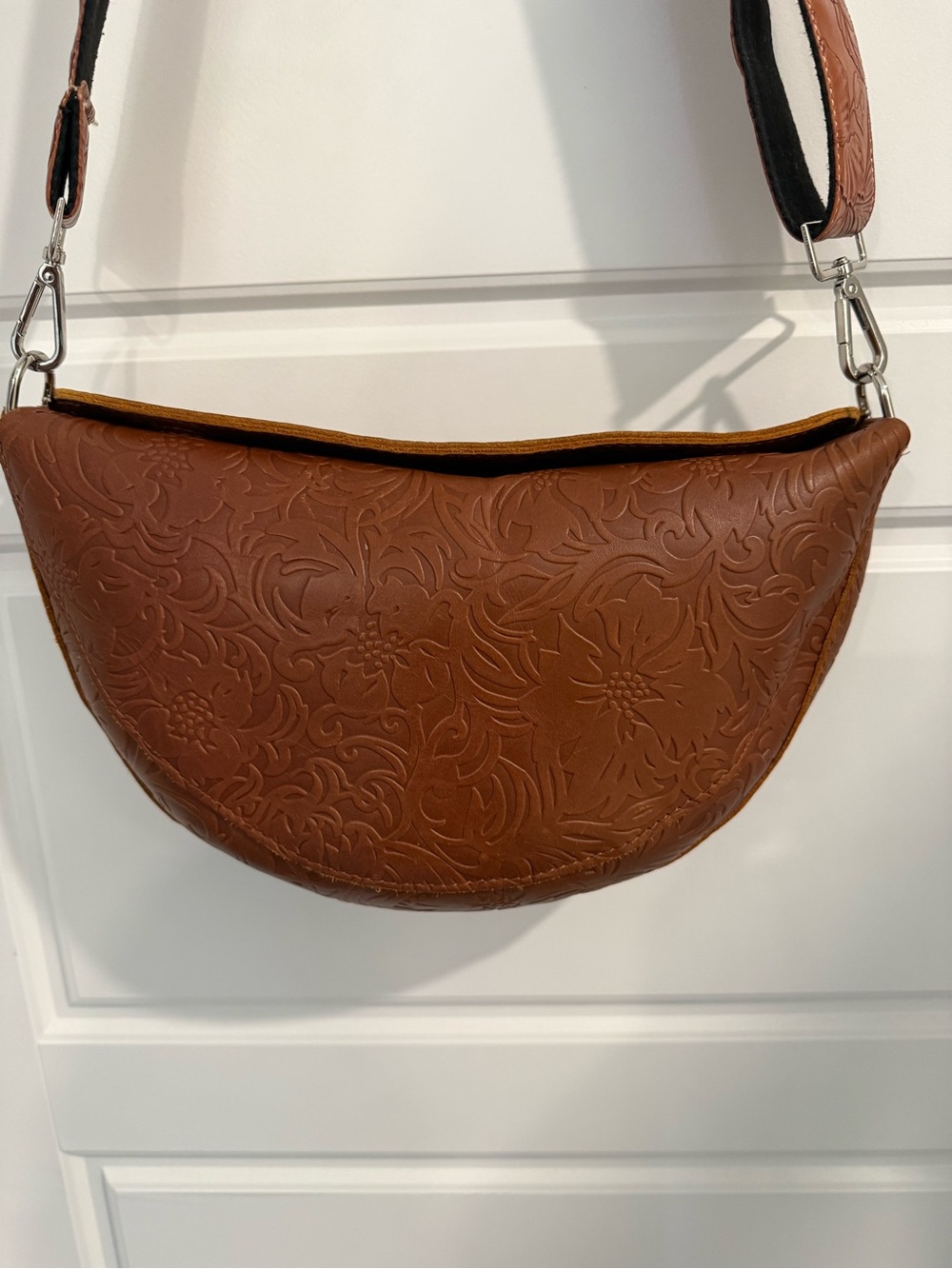 Embossed Brown Crescent Crossbody Bag